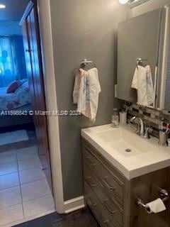 bathroom with vanity and tile patterned floors