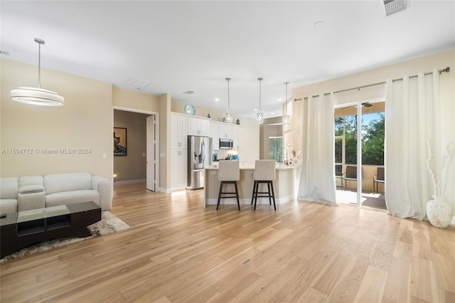 living room featuring light wood-type flooring