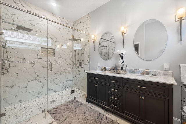 bathroom with tile patterned flooring, walk in shower, and double vanity