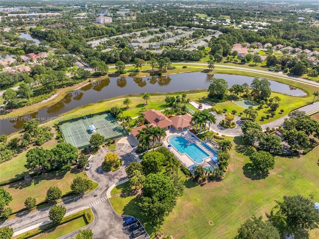 birds eye view of property featuring a water view