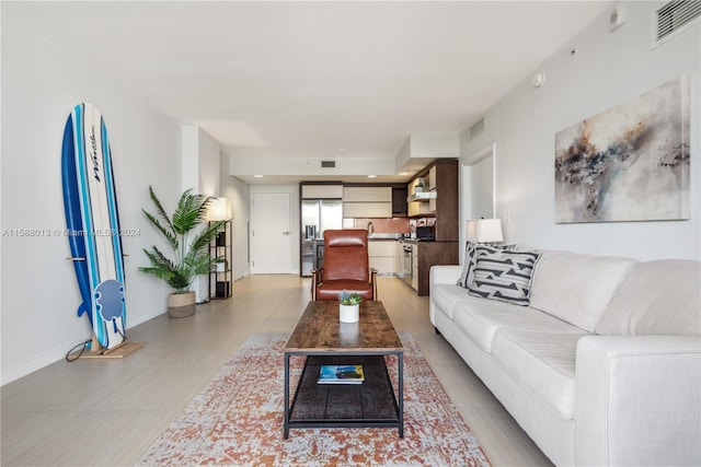 living room featuring sink