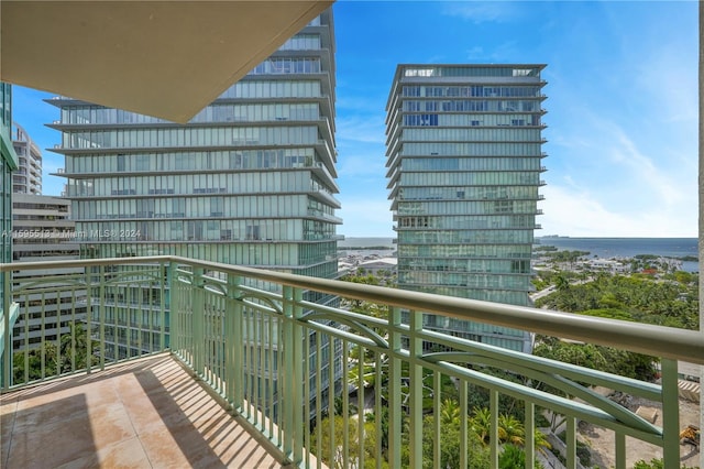 balcony featuring a water view