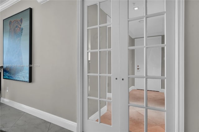 room details featuring crown molding and french doors