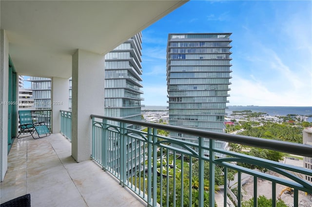 balcony featuring a water view