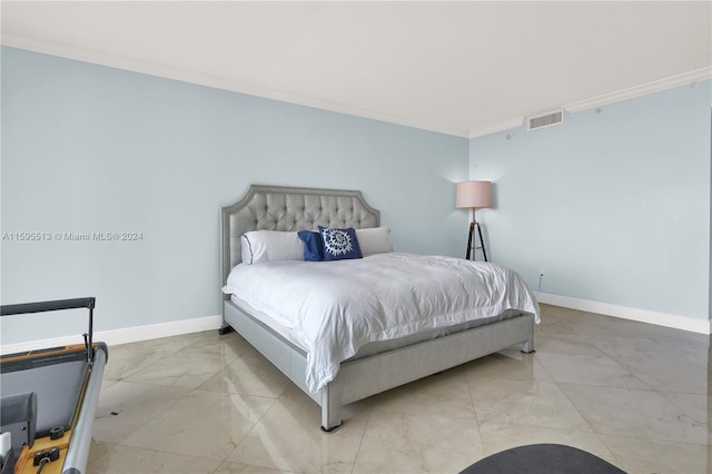 bedroom with ornamental molding