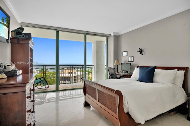 tiled bedroom with access to exterior, a wall of windows, ornamental molding, and multiple windows