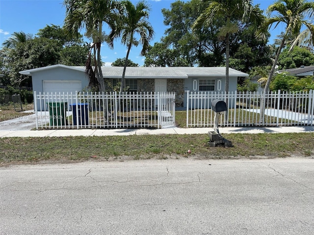 single story home with a garage