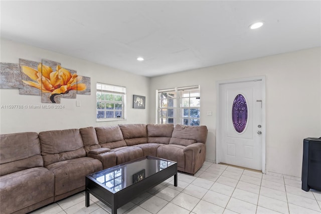 living room featuring light tile flooring