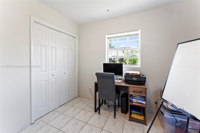 home office with light tile floors