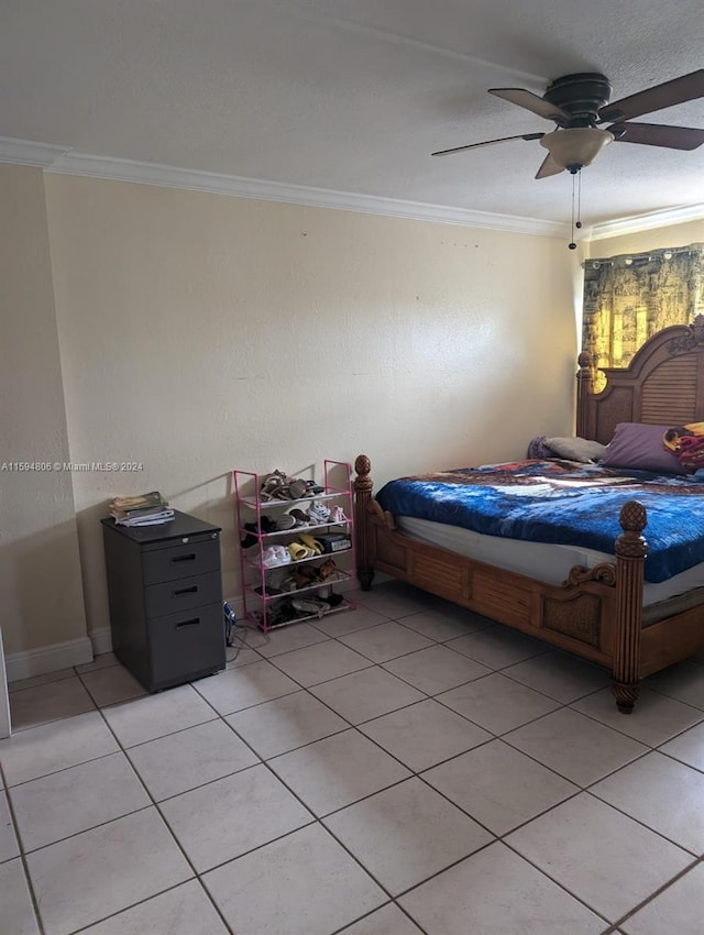 tiled bedroom featuring crown molding and ceiling fan