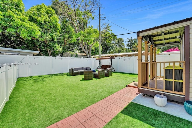 view of yard with an outdoor living space