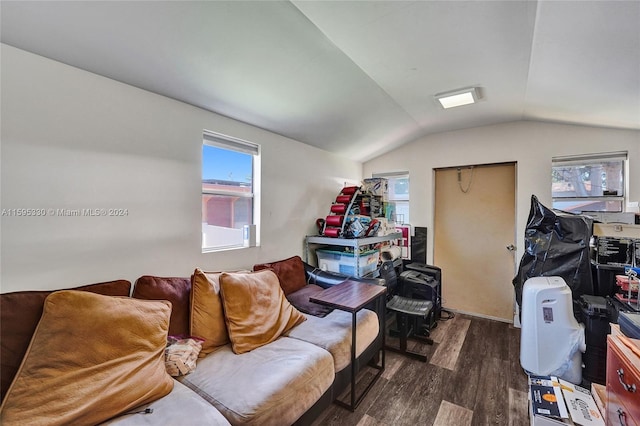 living room with dark hardwood / wood-style floors and vaulted ceiling