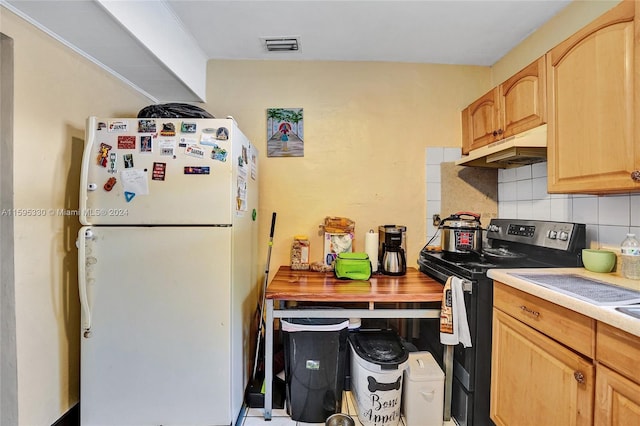 kitchen with wood counters, tasteful backsplash, light brown cabinets, white refrigerator, and electric stove