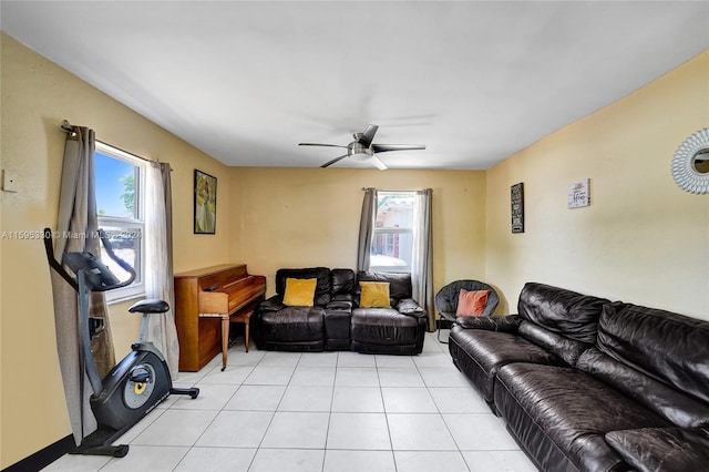 tiled living room featuring ceiling fan