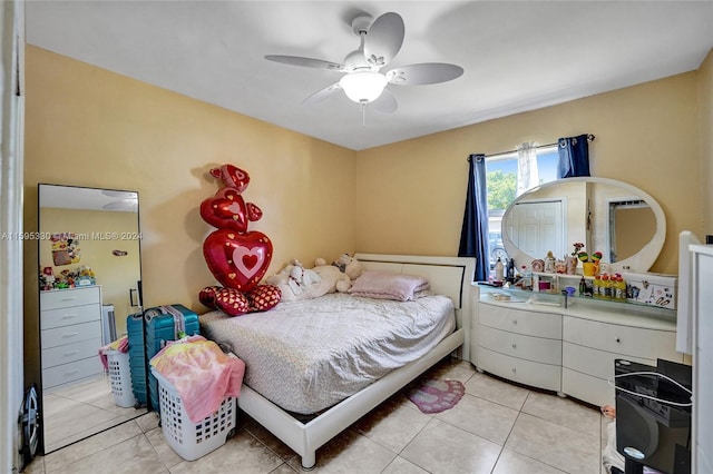 bedroom featuring ceiling fan and light tile patterned floors