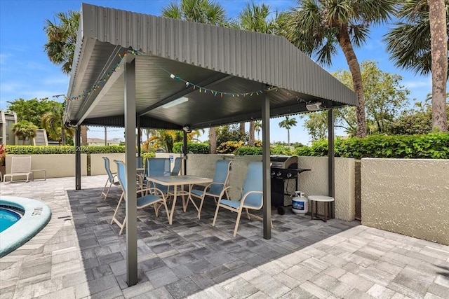 view of patio featuring a gazebo and grilling area