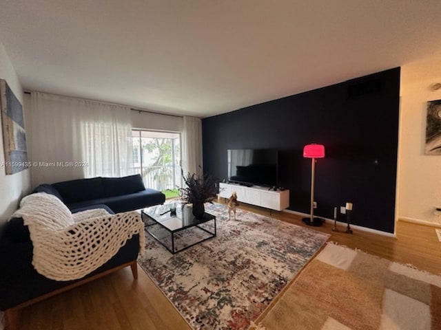 living room featuring wood-type flooring