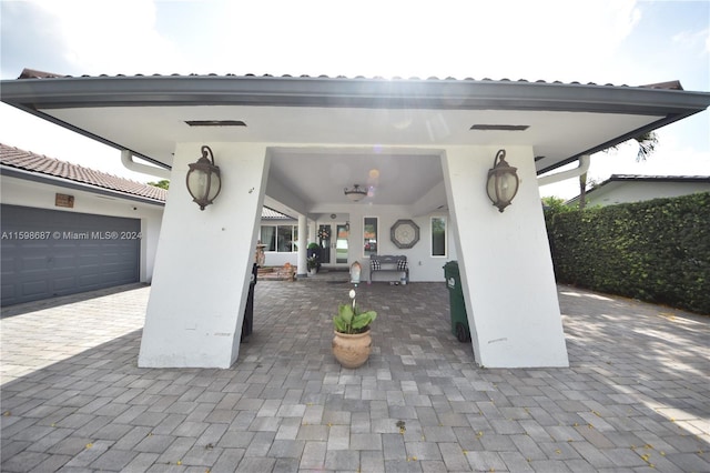 view of patio with ceiling fan