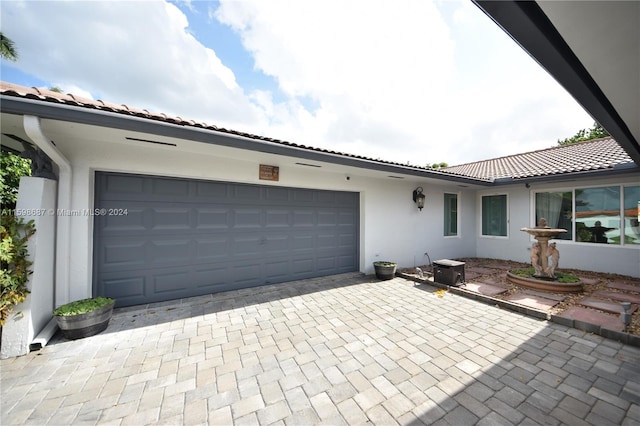 view of front of property featuring a garage