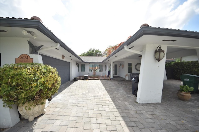 view of patio featuring a garage