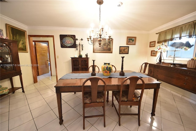 dining area featuring ornamental molding, light tile patterned flooring, and a chandelier