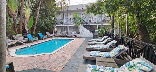 view of pool with a patio