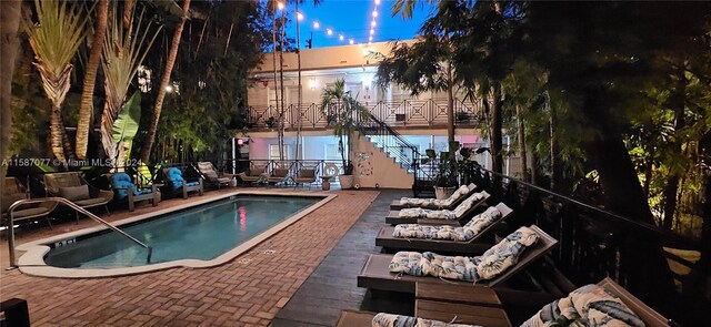 view of pool featuring a patio