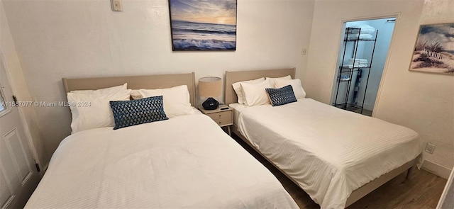 bedroom featuring hardwood / wood-style flooring