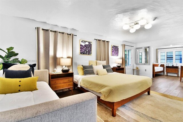 bedroom featuring wood-type flooring