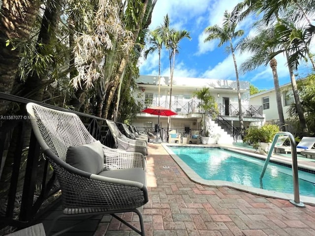 view of pool with a patio area