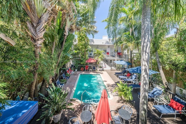 view of pool featuring a patio