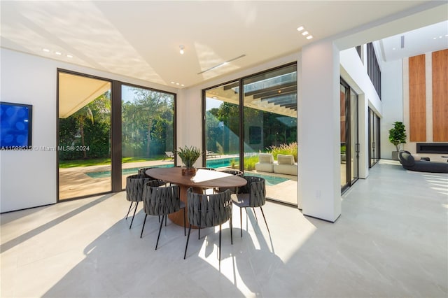 sunroom / solarium featuring plenty of natural light