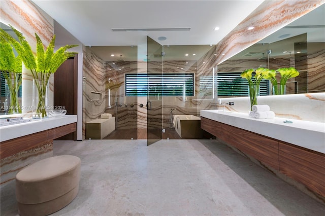 bathroom featuring vanity and an enclosed shower