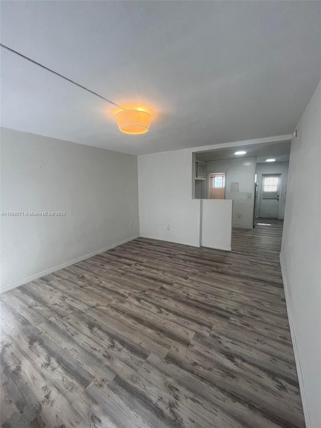 basement featuring wood-type flooring