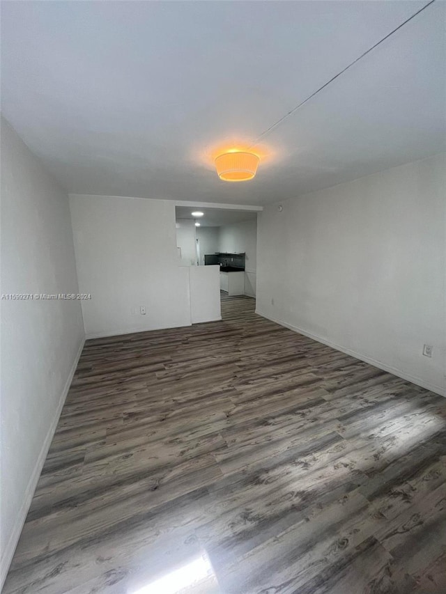 empty room featuring wood-type flooring