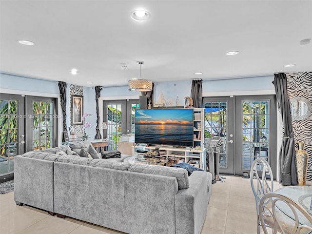 living room with french doors and light tile patterned flooring