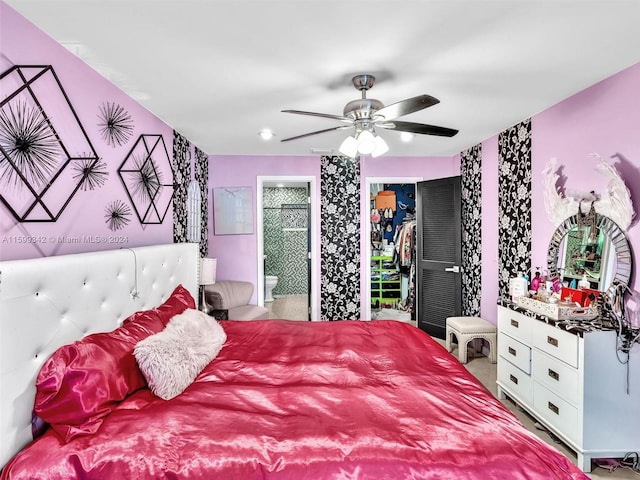 bedroom featuring ceiling fan and ensuite bathroom