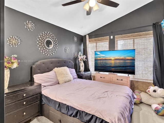 bedroom with ceiling fan and lofted ceiling