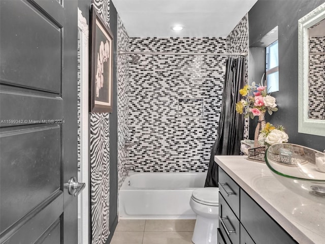 full bathroom with tile patterned flooring, vanity, toilet, and shower / bathtub combination with curtain