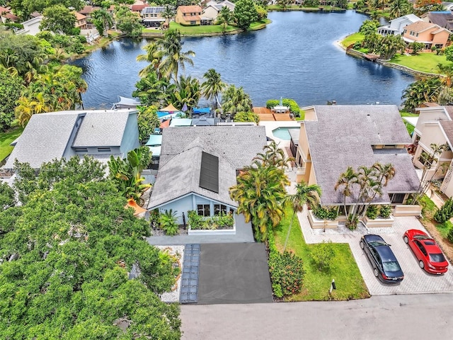 birds eye view of property featuring a water view