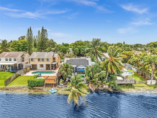 bird's eye view with a water view