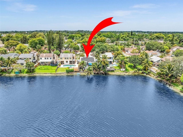 birds eye view of property featuring a water view