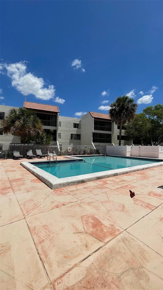 view of pool with a patio