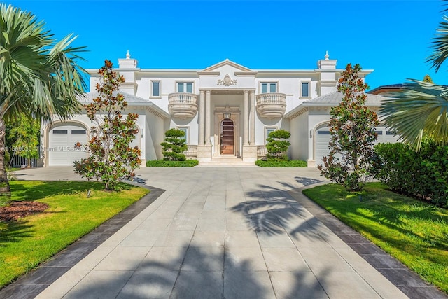 view of front facade featuring a balcony and a front lawn