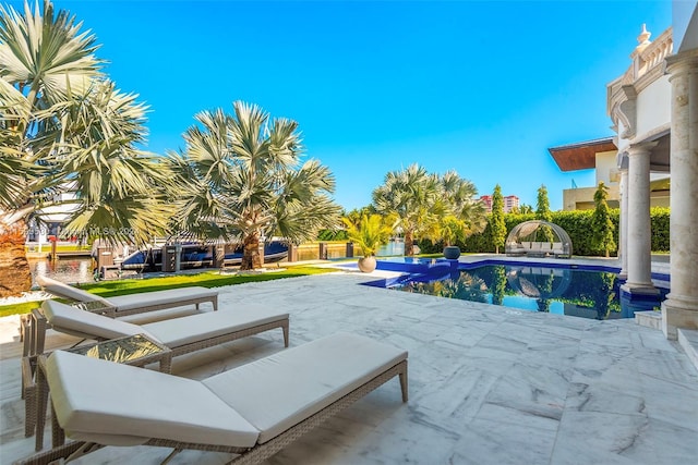 view of pool with a patio