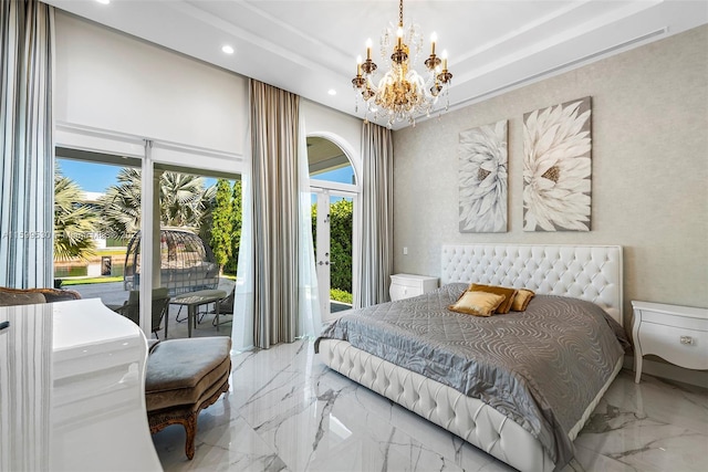 bedroom with access to exterior and an inviting chandelier