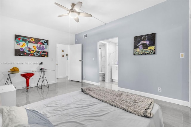 bedroom featuring ensuite bath and ceiling fan