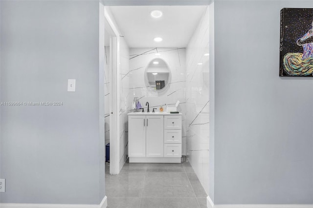 bathroom with vanity and tile patterned flooring