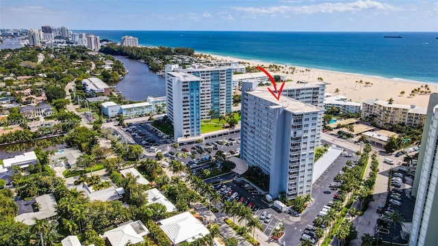 aerial view featuring a water view and a view of the beach