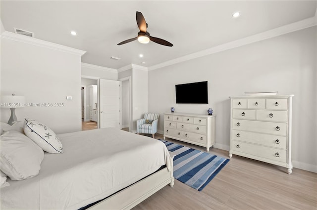 bedroom with ornamental molding, ceiling fan, and light wood-type flooring